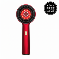 Scalp massager with badge in top right corner